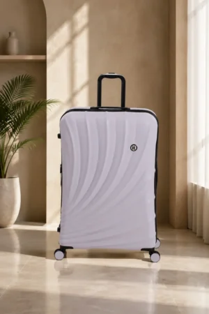 Maleta carry on rígida IT Luggage con diseño ondulado color lila